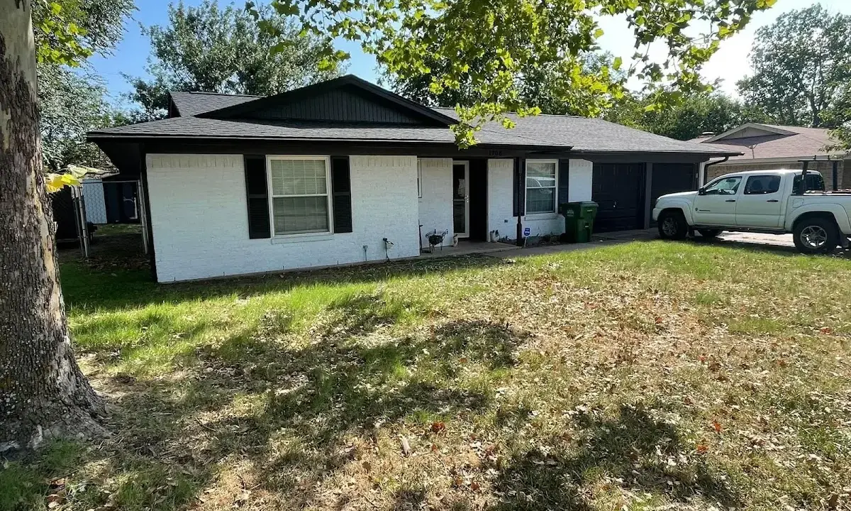 Professional roofing crew working on a residential roof in Seffner